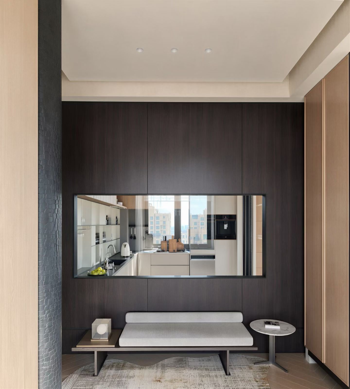 Foyer bench with window into the kitchen